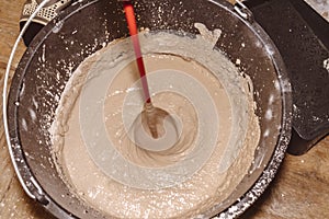 Preparing a mortar plaster stirring mix water consistency emulsion finishing