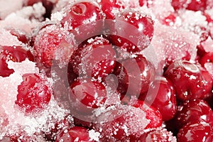 Preparing organic cherry jam.