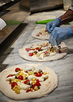 Preparing Pizza dought at the pizzeria.