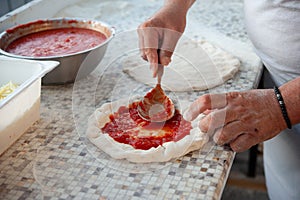 Preparing Pizza dought at the pizzeria.