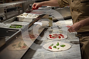 Preparing Pizza dought at the pizzeria.