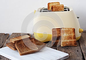 Preparing a quick breakfast. Homemade toaster with rye and white bread slices