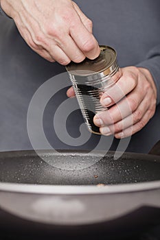 Preparing sauce with meat for spaghetti with pork and beef, tomato and cheese