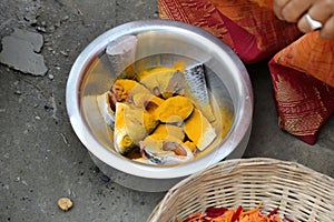 Preparing spicy and hot fish curry, Kumrokhali, West Bengal, India