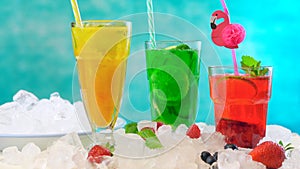 Preparing Summer Spritzer drinks with fresh fruit with sparkling mineral water.