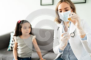 Preparing a vaccine for little girl