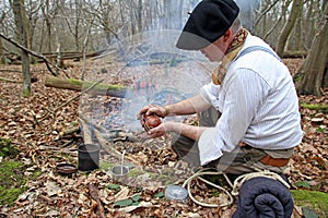 Preparing yerba mate in woods photo