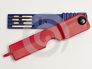 Prepayment meter key, red & blue.