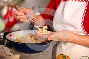 Prepearing russian pelmeni with potates