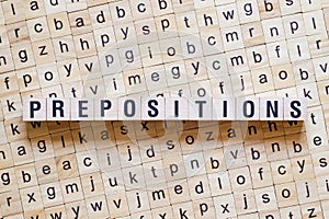Prepositions word concept on cubes