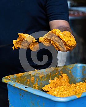 Prepping the chicken skew Kebab barbeque with marinated spices. Traditional Indian and Pakistan dish