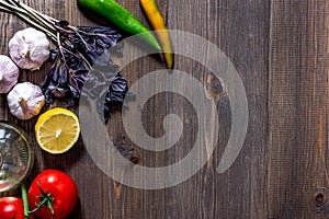 Prepring for cooking dinner. Vegetables on wooden table background top view copyspace photo