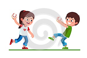 Preschool boy and girl playing with baseball game