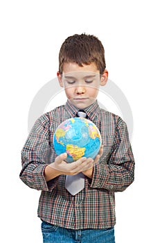 Preschool boy holding a globe