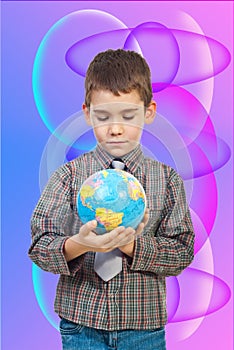 Preschool boy holding a globe