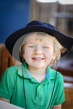 Preschool boy smiling and posing for kindy portraits