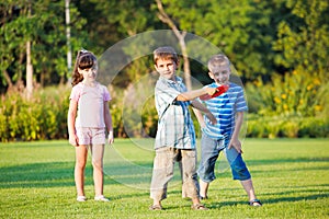 Preschool boy throwing frisbie photo