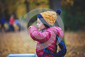 Preschool child, boy, sneezing in park, flu season photo