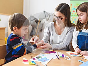 Preschool Teacher with Children at Kindergarten - Creative Art Class