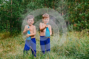 Preschoolchildren splash water photo