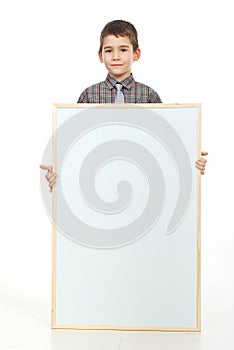 Preschooler holding blank placard