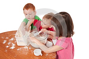 Preschooler kids making mess in kitchen