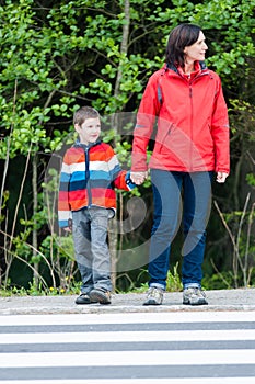 Preschooler with Mother by the Crosswalk