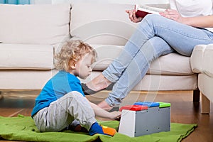 Preschooler playing on the floor