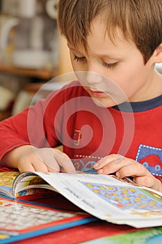 Preschooler reading book