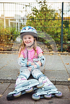 Preschooler with roller skates on