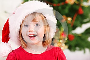 Preschooler in Santa hat