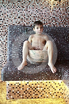 Preschooler sitting in hammam