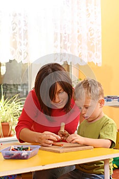 Preschooler with wooden blocks