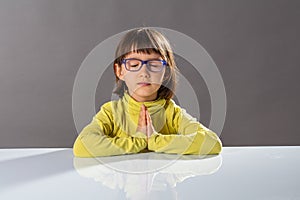 Preschooler yoga kid relaxing with mindfulness and calm at school