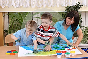 Preschoolers and fingerpainting photo