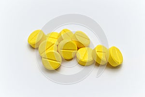 Prescription drugs,medicine of tablets or pills with yellow color.
