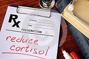 Prescription form with words reduce cortisol.