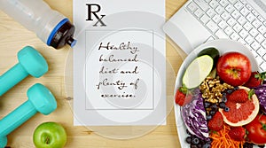 Prescription for good health diet and exercise flat lay overhead.