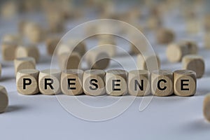 Presence - cube with letters, sign with wooden cubes photo