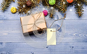 Present box and gift tag copy space. Winter time and christmas holidays concept. Tips for preparing christmas in advance