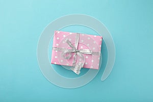 Present boxes on blue background greeting card holidays concept. Happy Mother`s day