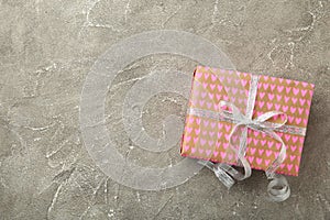 Present boxes on grey background greeting card holidays concept. Happy Mother`s day