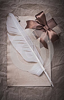 Present boxes sheet of wrapping paper feather