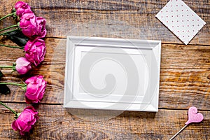 present design with peony bouquet and white frame top view mock up