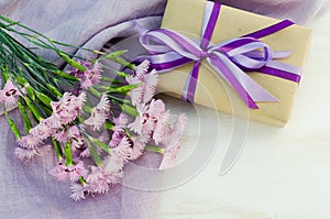 Present or gift box and tender flowers