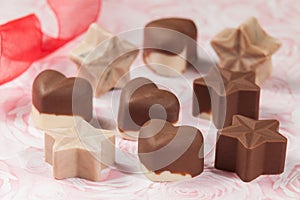 Present To Share; Tasty Chocolates With Star And Heart Shapes