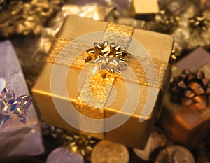 Present wrapped in gold gift wrapping