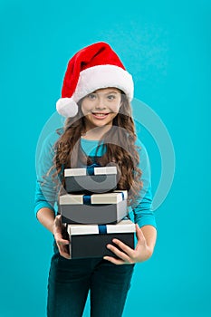 Present for Xmas. Childhood. New year party. Santa claus kid. Christmas shopping. Happy winter holidays. Small girl