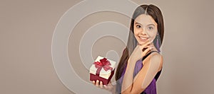 Present you will admire. Happy girl hold present box. Birthday gift. Kid girl with gift, horizontal poster. Banner