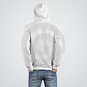 Presentation template of a white hoodie mockup on a young guy, rear view